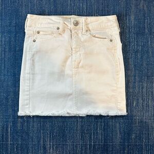 White denim mini skirt